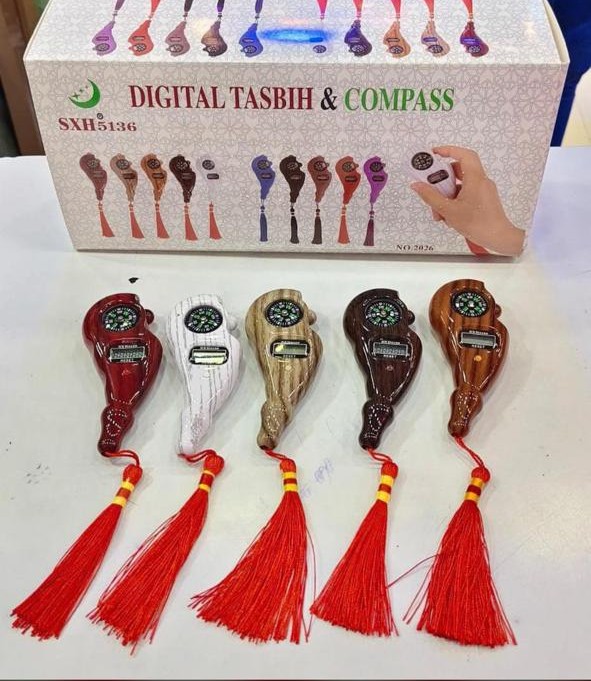 Digital tasbih counter with compass and tassel in multiple colors, featured in Tradozic’s best deals on gadgets.